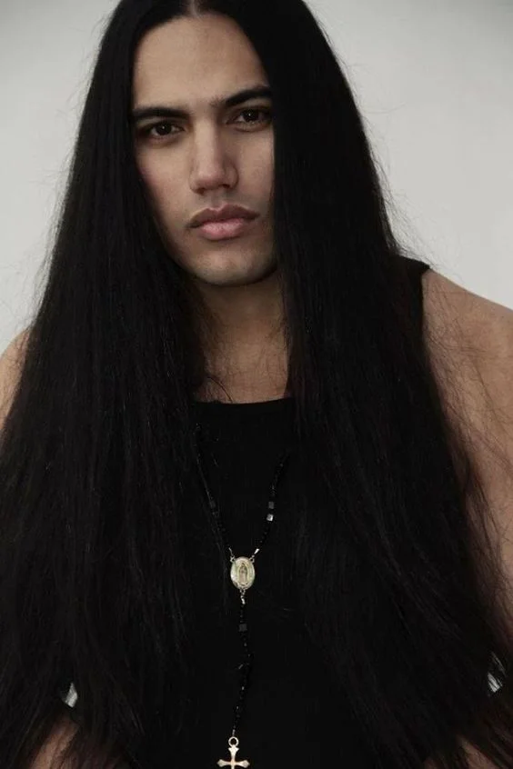Lou : Woof! Those long, luscious locks drape perfectly around his chiseled face. (2nd cousin)