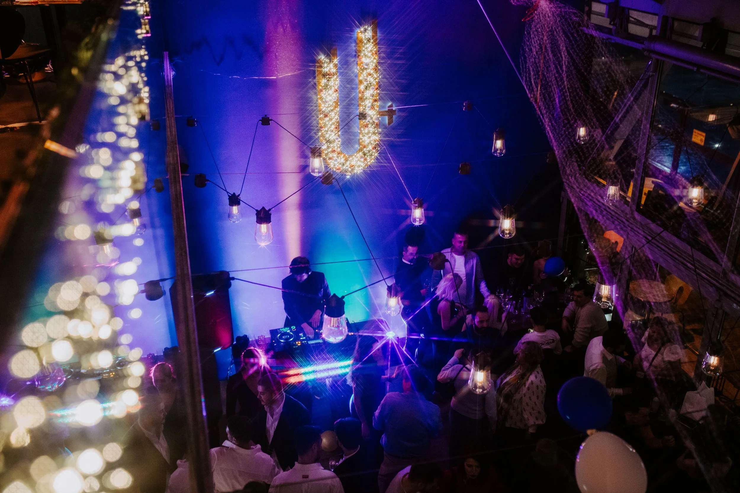 Live DJ at Urban Brewing during New Year's Eve Midnight Society celebration.