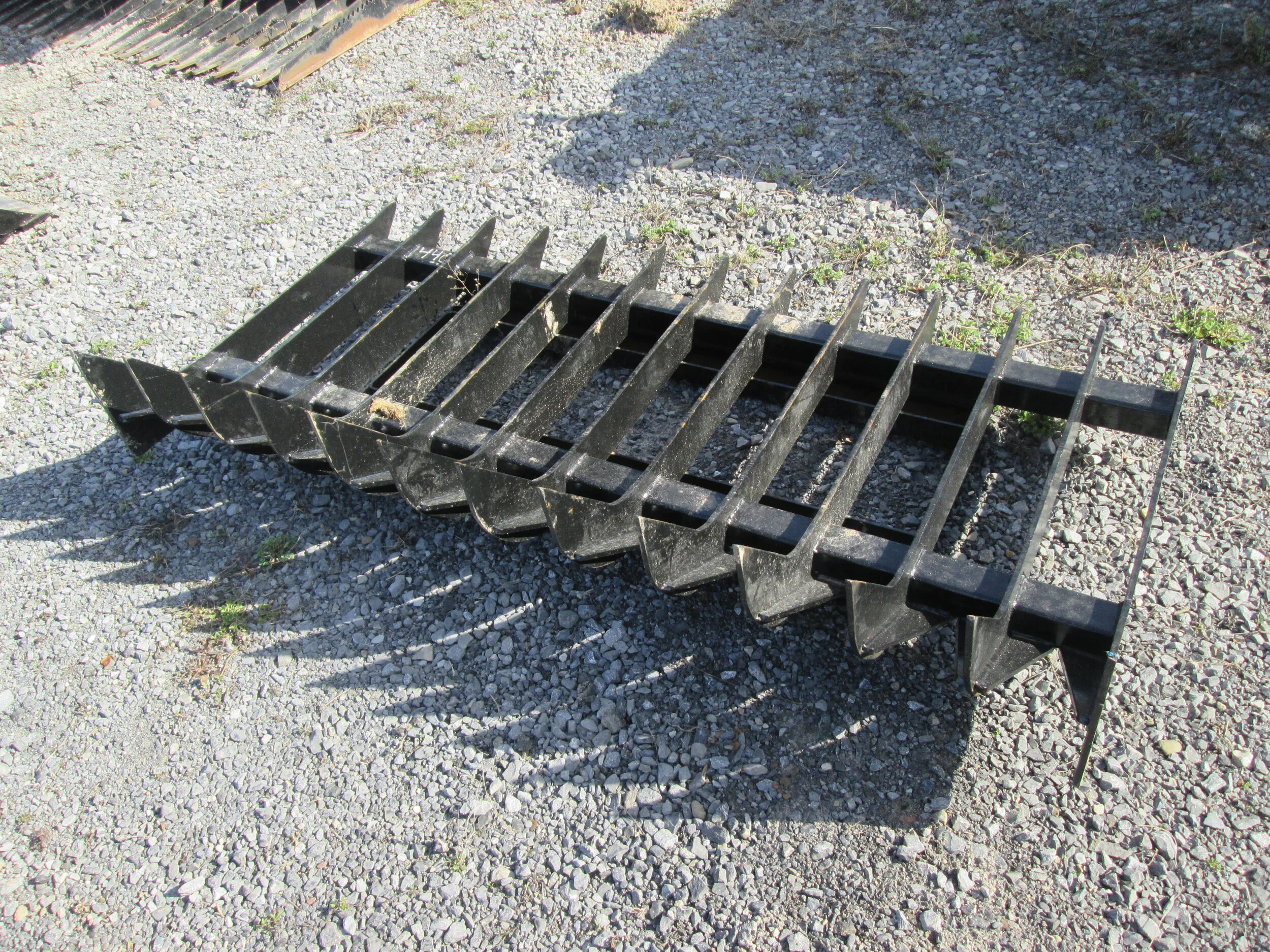 Skid Steer Root Rakes — Carroll Equipment CNY'S Best Place For