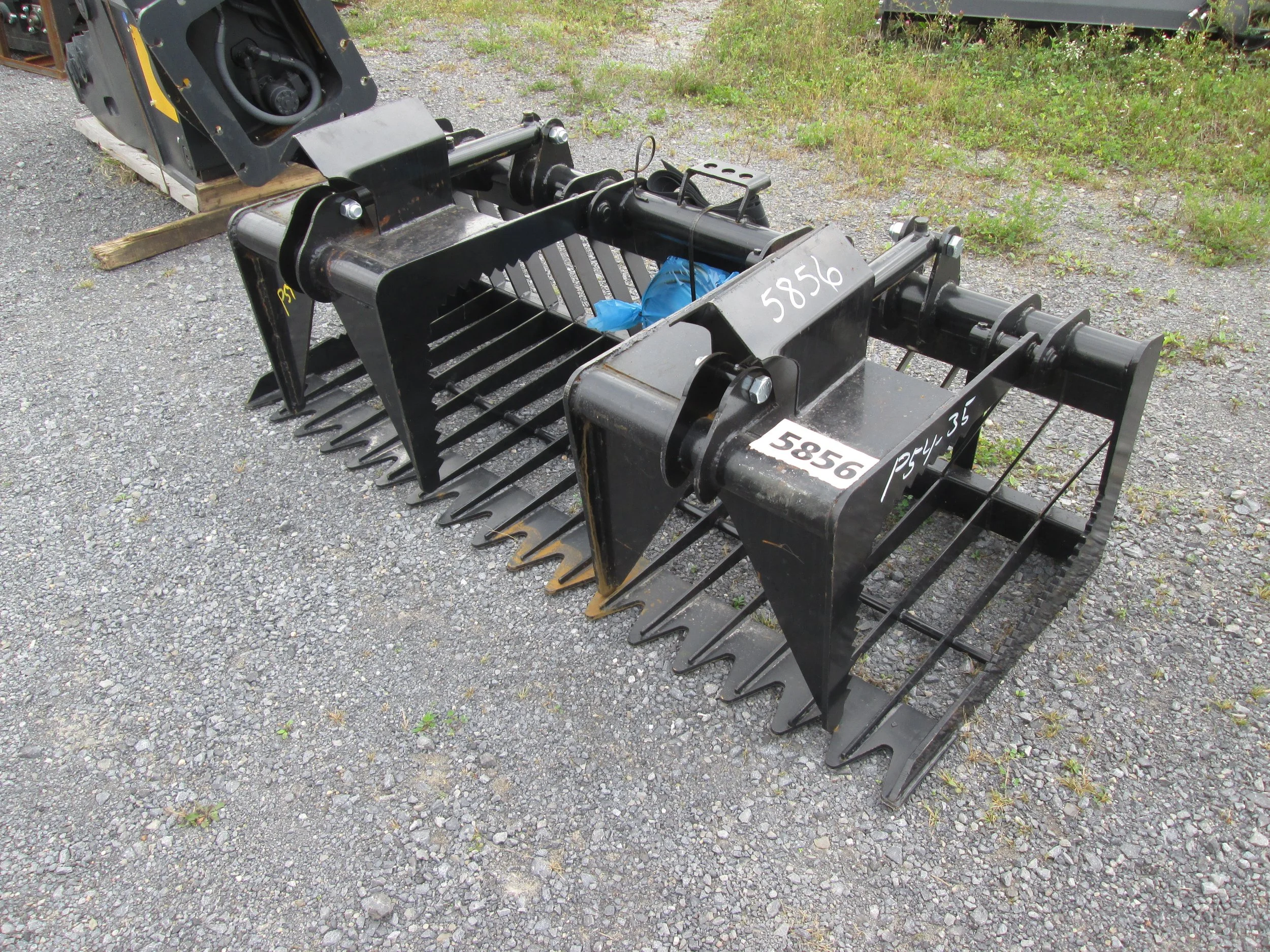 Skid Steer Root Grapples — Carroll Equipment CNY'S Best Place For