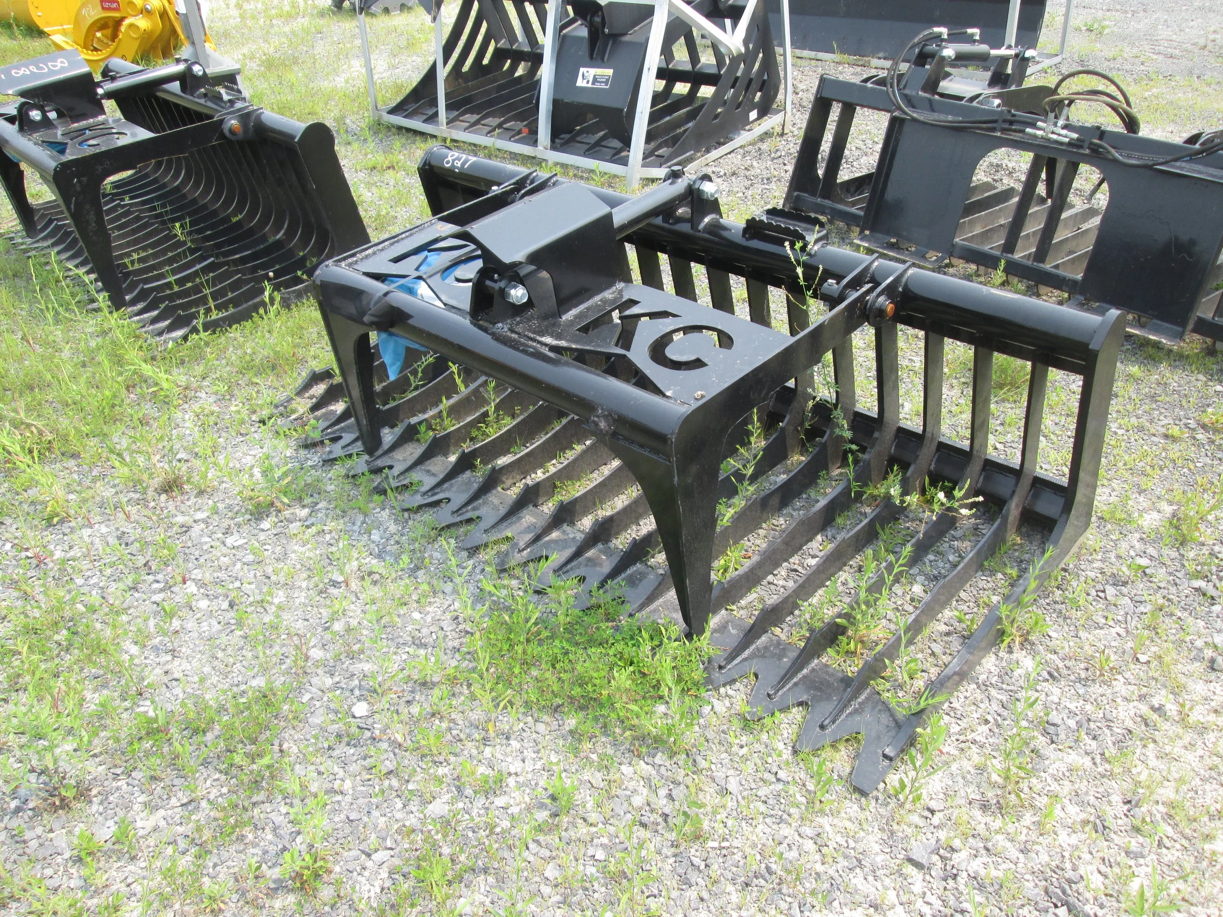 Skid Steer Root Grapples — Carroll Equipment CNY'S Best Place For