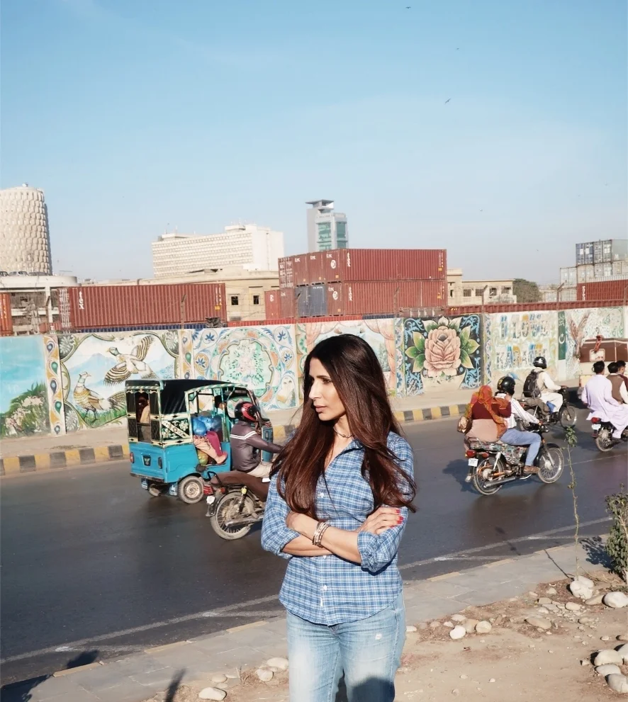 Watching traffic go by near Mai Kolachi Bridge (love Isaad's shadow)