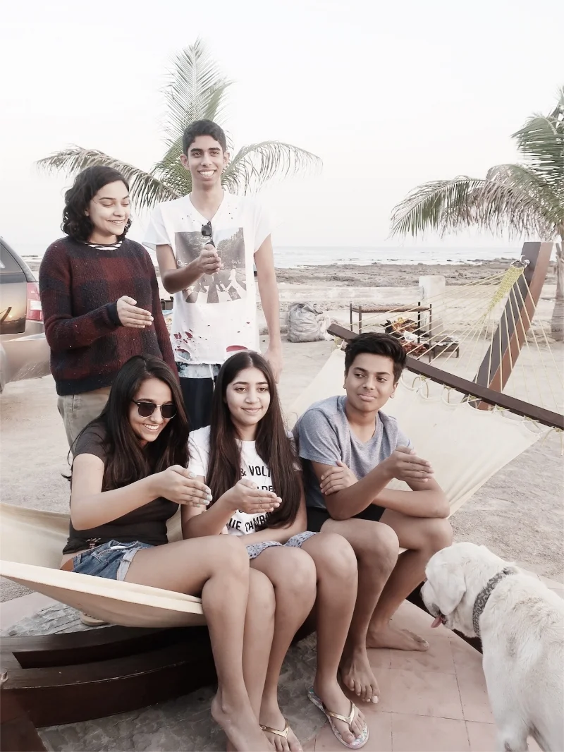 The 5 cousins & Elmo being silly at the beach