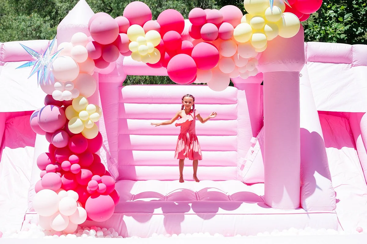 pink-bounce-house-at-kids-party.jpg