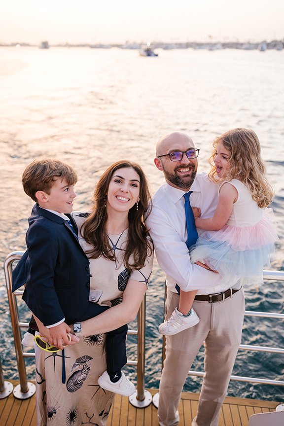 famil-portrait-at-stern-of-boat.jpg