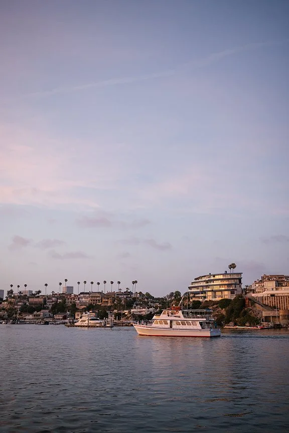 scenic-photo-of-boat-at-sunset.jpg
