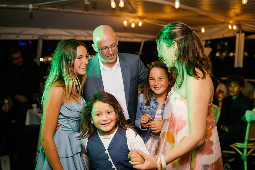family-of-five-dancing-on-dance-floor.jpg