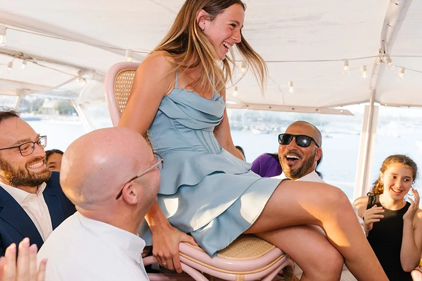 girl-laughing-on-hora-chair.jpg