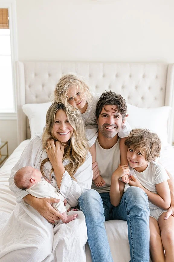 family-piled-up-smiling.jpg