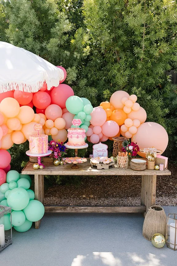 dessert-table-surrounded-by-balloons.jpg