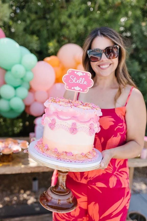 woman-holding-giant-cake.jpg