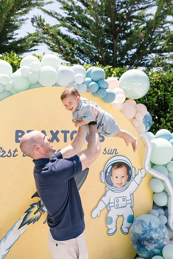 father-holding-baby-son-in-air.jpg
