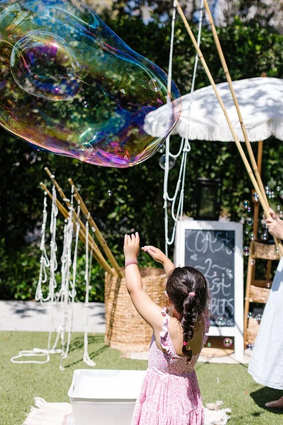 girl-chasing-large-bubbles.jpg