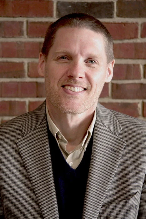 Dr. Rob Reimer Professor: Theology of the Kingdom Rev. Dr. Rob Reimer earned a B.A. in English from King’s College, a M. Div. from Alliance Theological Seminary, and a Doctorate in Preaching from Gordon-Conwell Theological Seminary. He was the founding and former lead pastor of South Shore Community Church until June 2017. He is now a professor at Alliance Theological Seminary for the Doctorate of Ministry. Rob is also an accomplished author. His books, Soul Care, Deep Faith, River Dwellers, and Pathways to the King have been sold worldwide. Rob regularly speaks at conferences, leadership retreats, mission fields, churches, and seminaries in the United States and abroad. Rob and his wife, Jen, live in the Nyack, NY area with their four children, Danielle, Courtney, Darcy, and Craig.