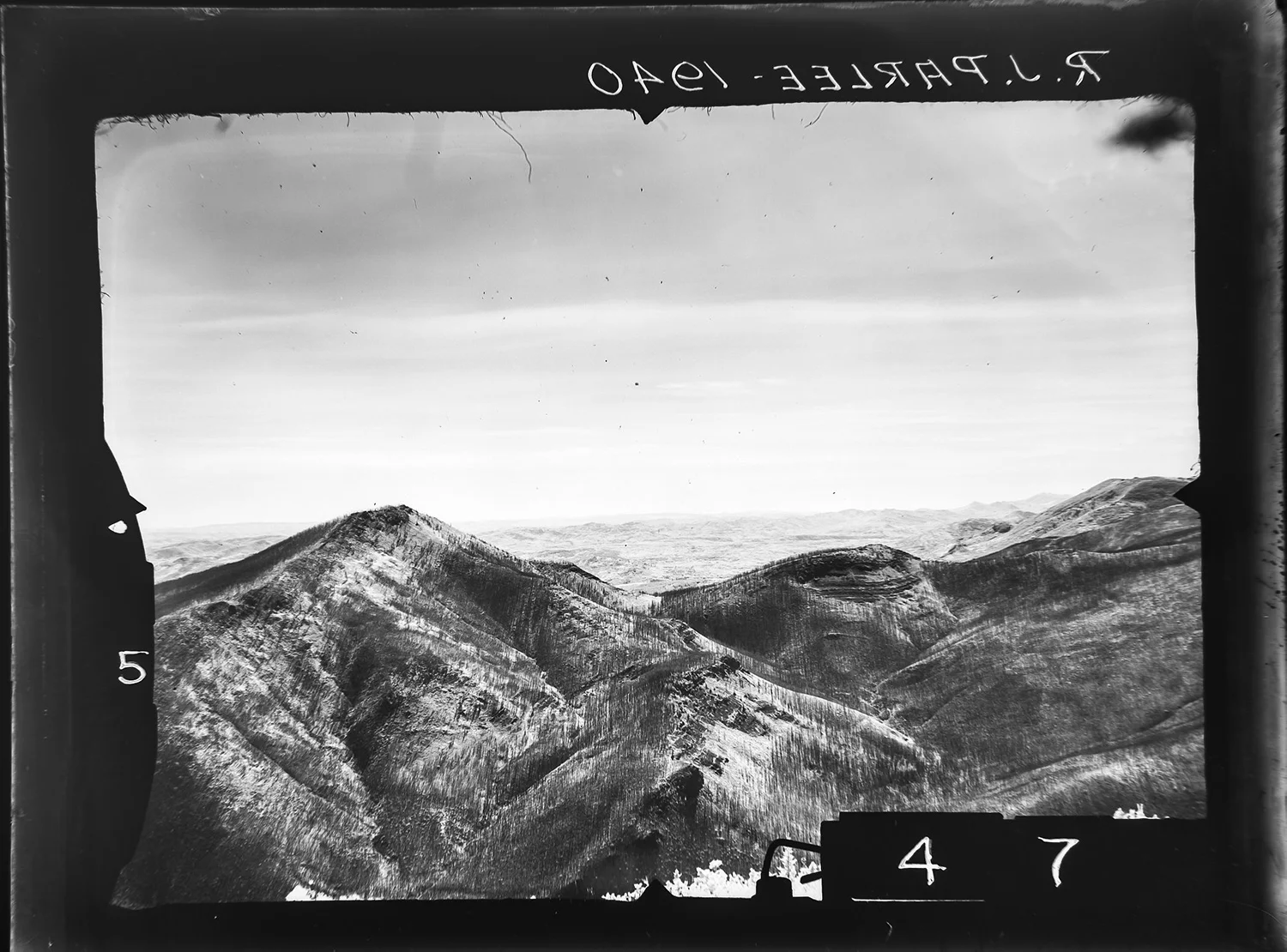 This photo was taken by R. J. Parlee in 1940, west of High River, Alberta. The Mountain Legacy Project team re-captured this image on July 7, 2017. You can compare all the photos from this station here . Image courtesy of the Mountain Legacy Project .