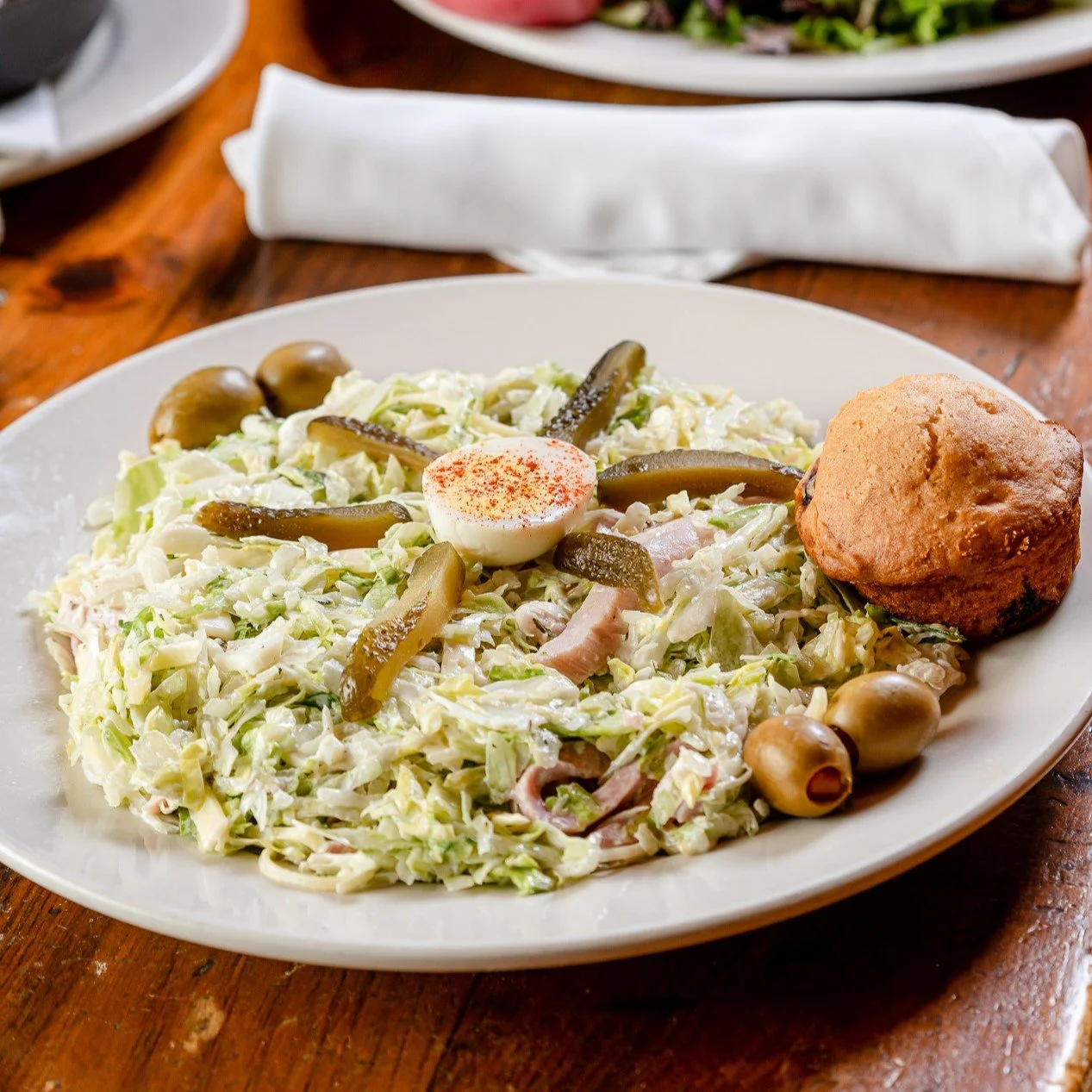 Savoring Tradition: The Story Behind the Classic Maurice Salad at Deadwood Bar &amp; Grill