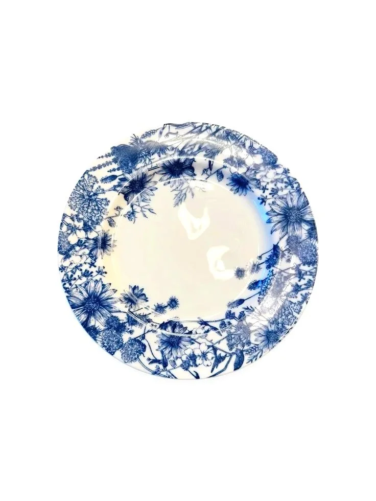 Blue floral porcelain dinner plate with rim detail, inspired by wildflowers and designed for everyday table settings