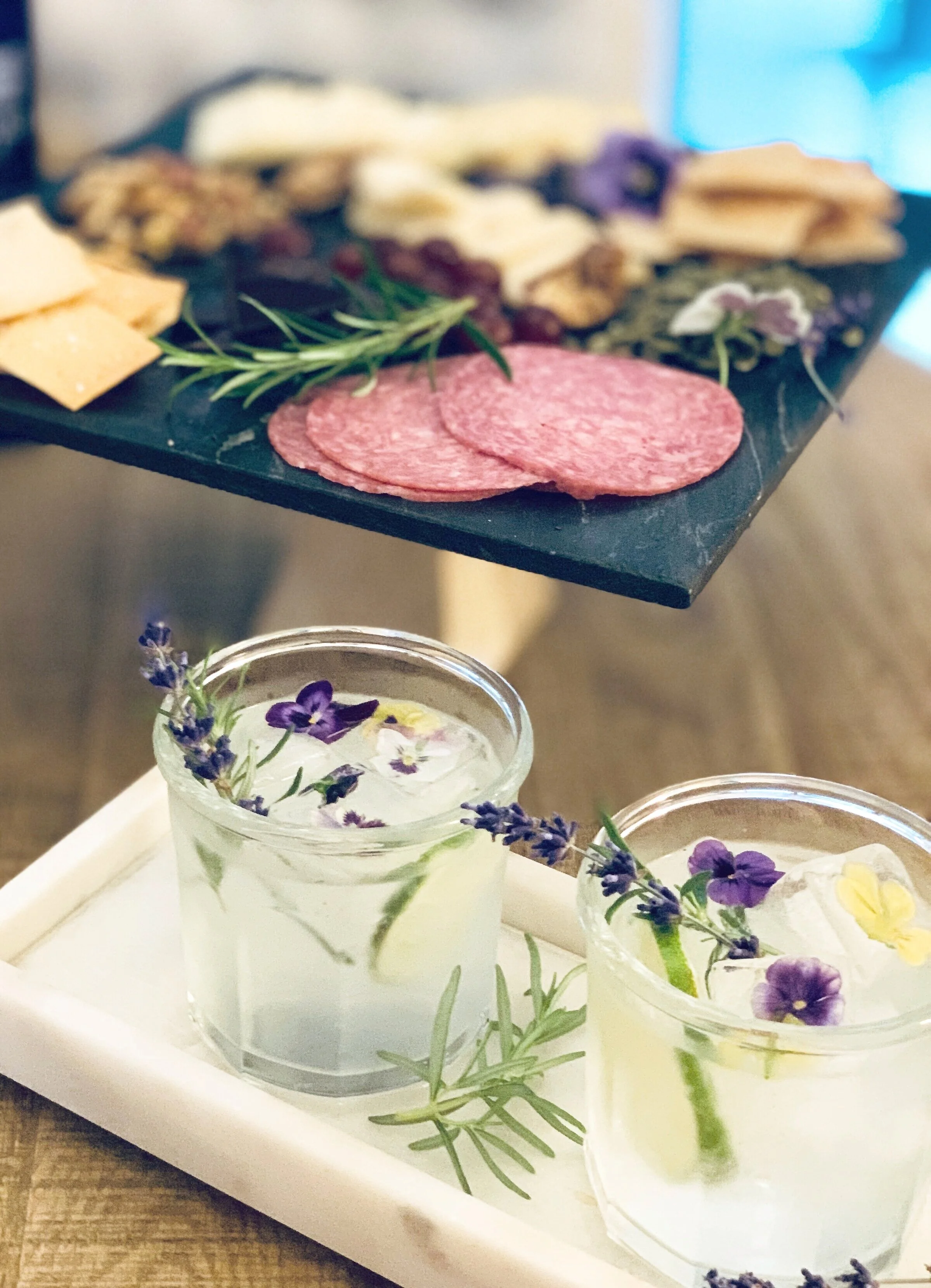 I love these French style glasses for a cocktail. They are casual for an outdoor gathering. Putting little botanicals in your drink is a nice addition. I put rosemary in mine along with lavender and lime. It was really very delicious.