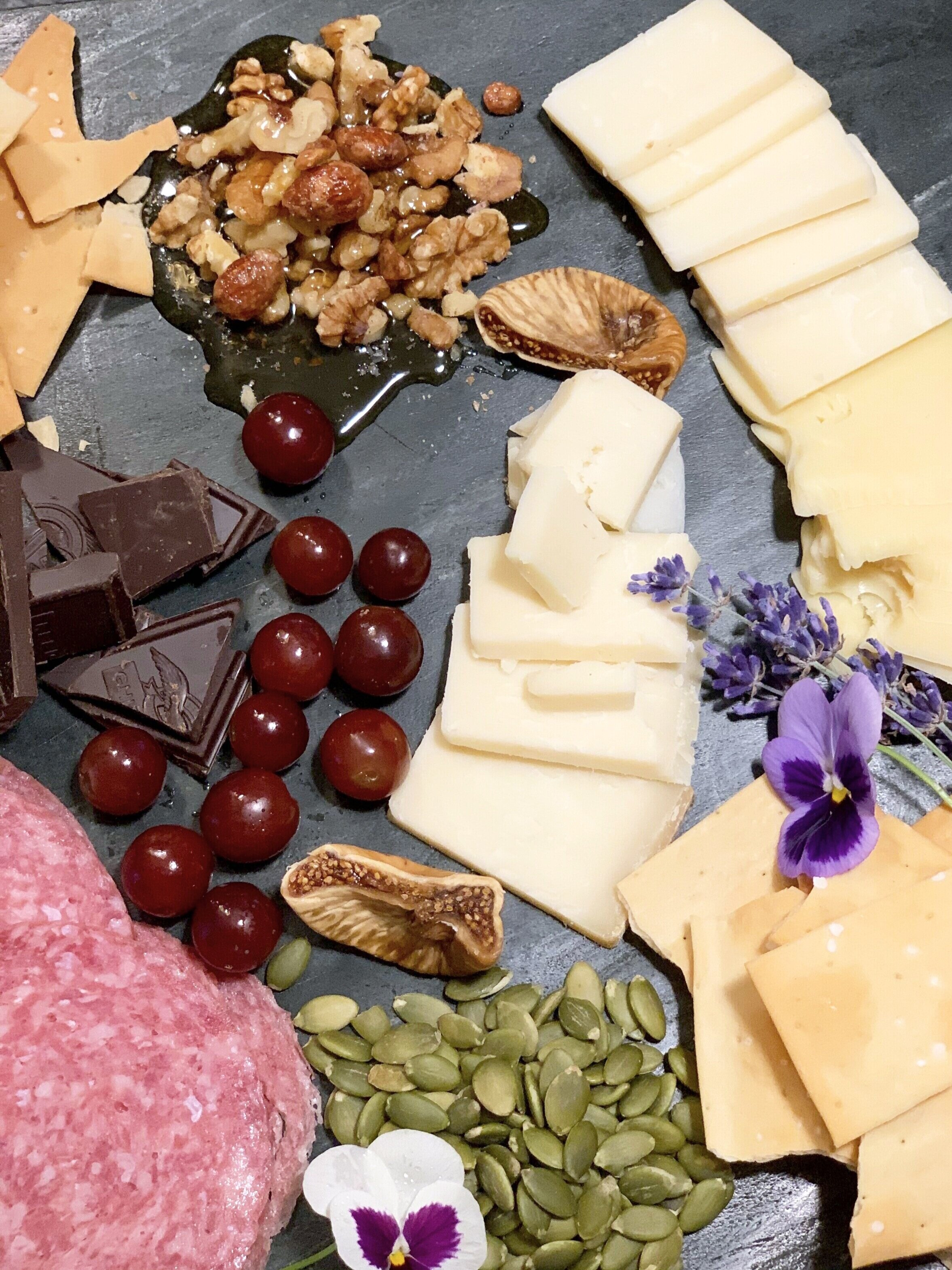 Cheese Plate decorated with pansies, violas, and lavender. The blooms really do make the presentation. It’s all about the pop of color!