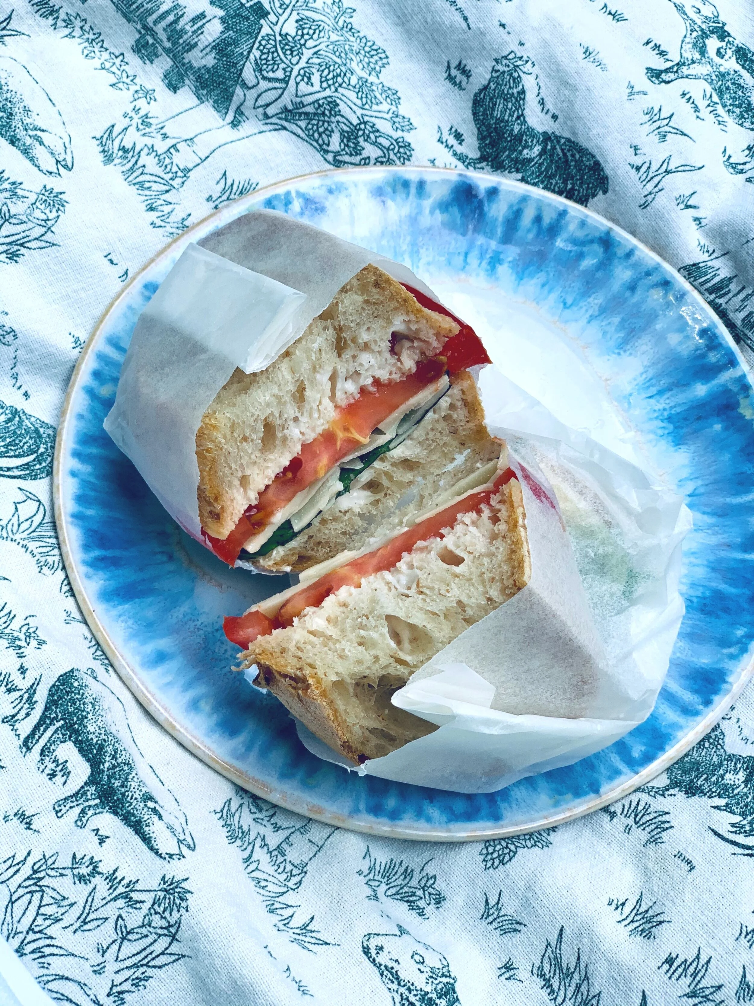 I used a few slices of Pain De Campagne from the Bantam Bread Co. to make these sandwiches. Here is one with heirloom tomatoes, sliced parmigiana reggiano, basil and mayonnaise.