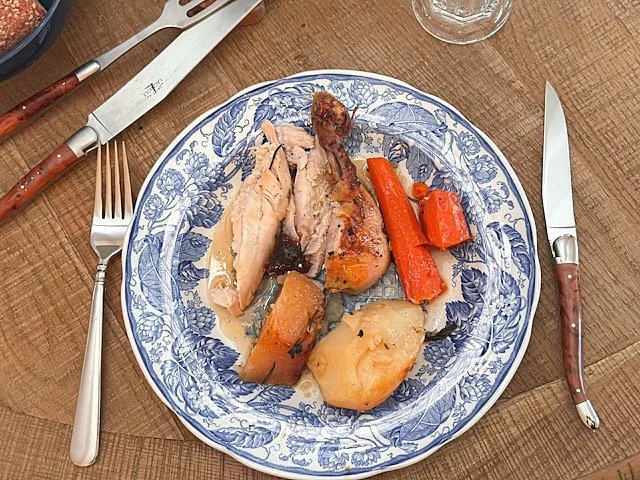 Plated French roast chicken with root vegetables and pan juices from a Sunday slow living recipe inspired by French home cooking — Merze Lifestyle