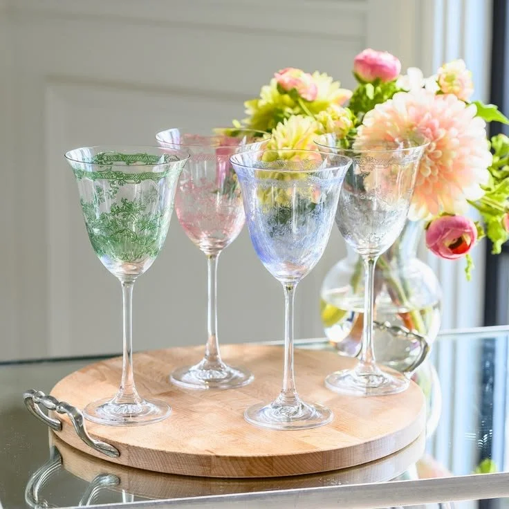 Giardino etched glassware collection in multiple colors shown for context