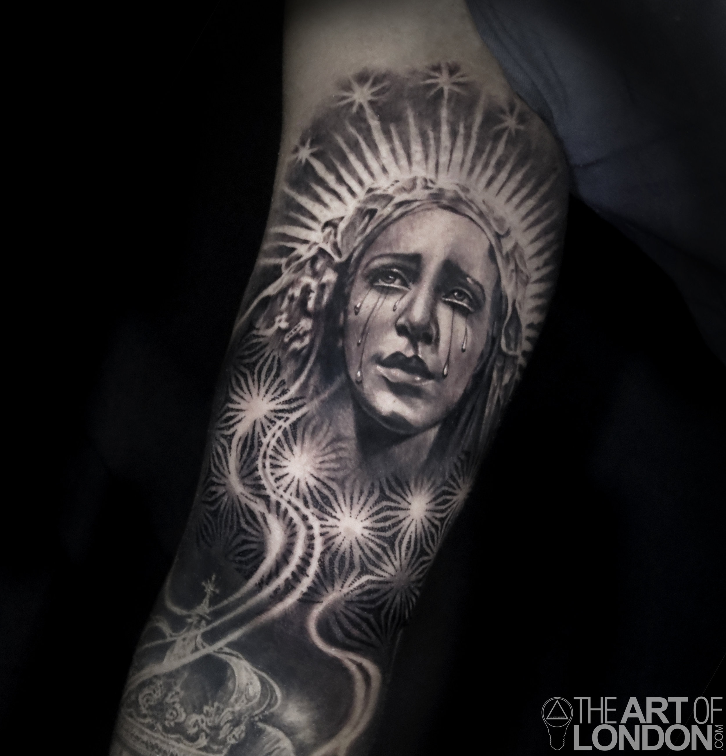virgin mary guatemalan statue tattoo.jpg