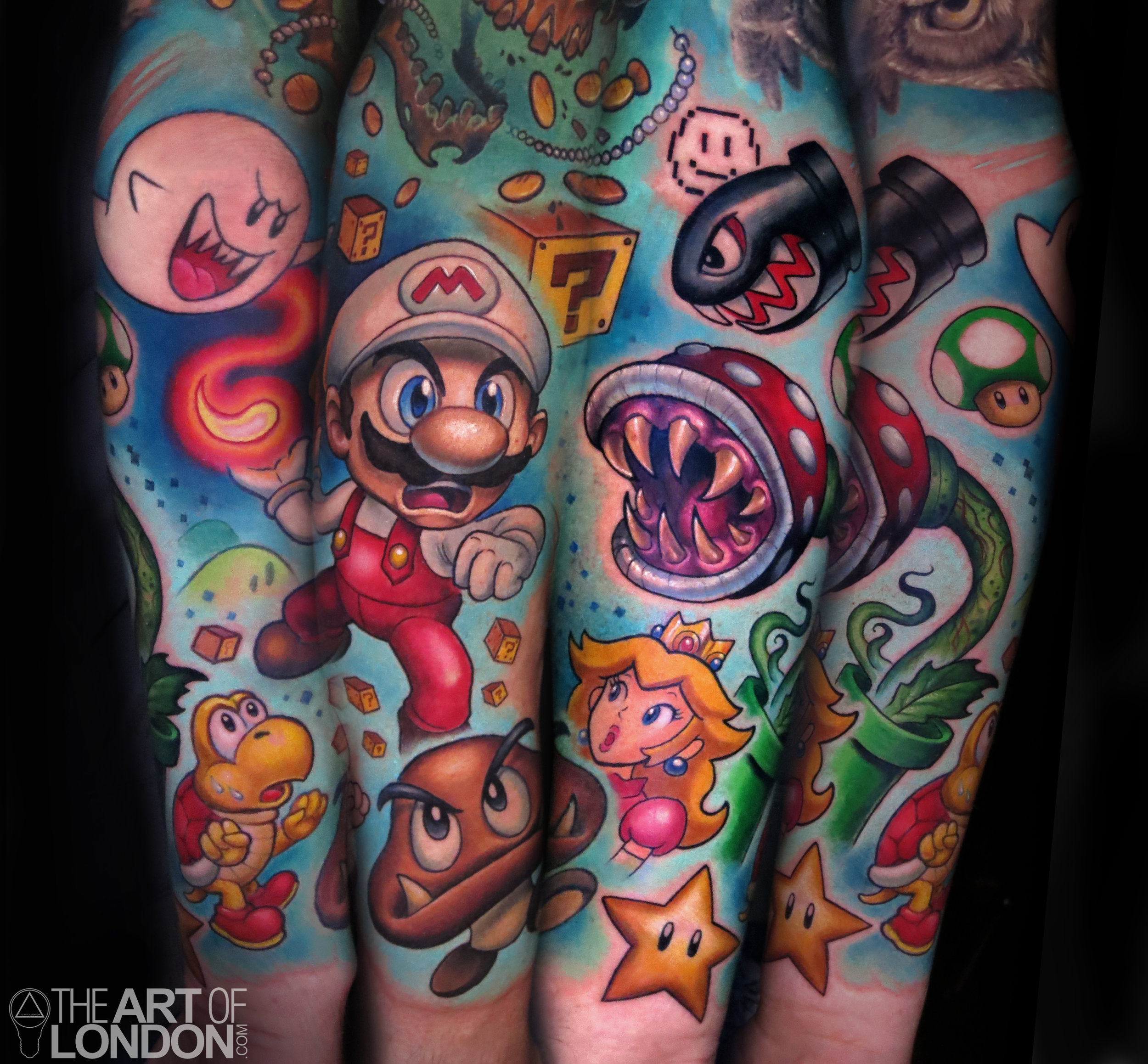 mario brothers video game tattoo half sleeve.jpg