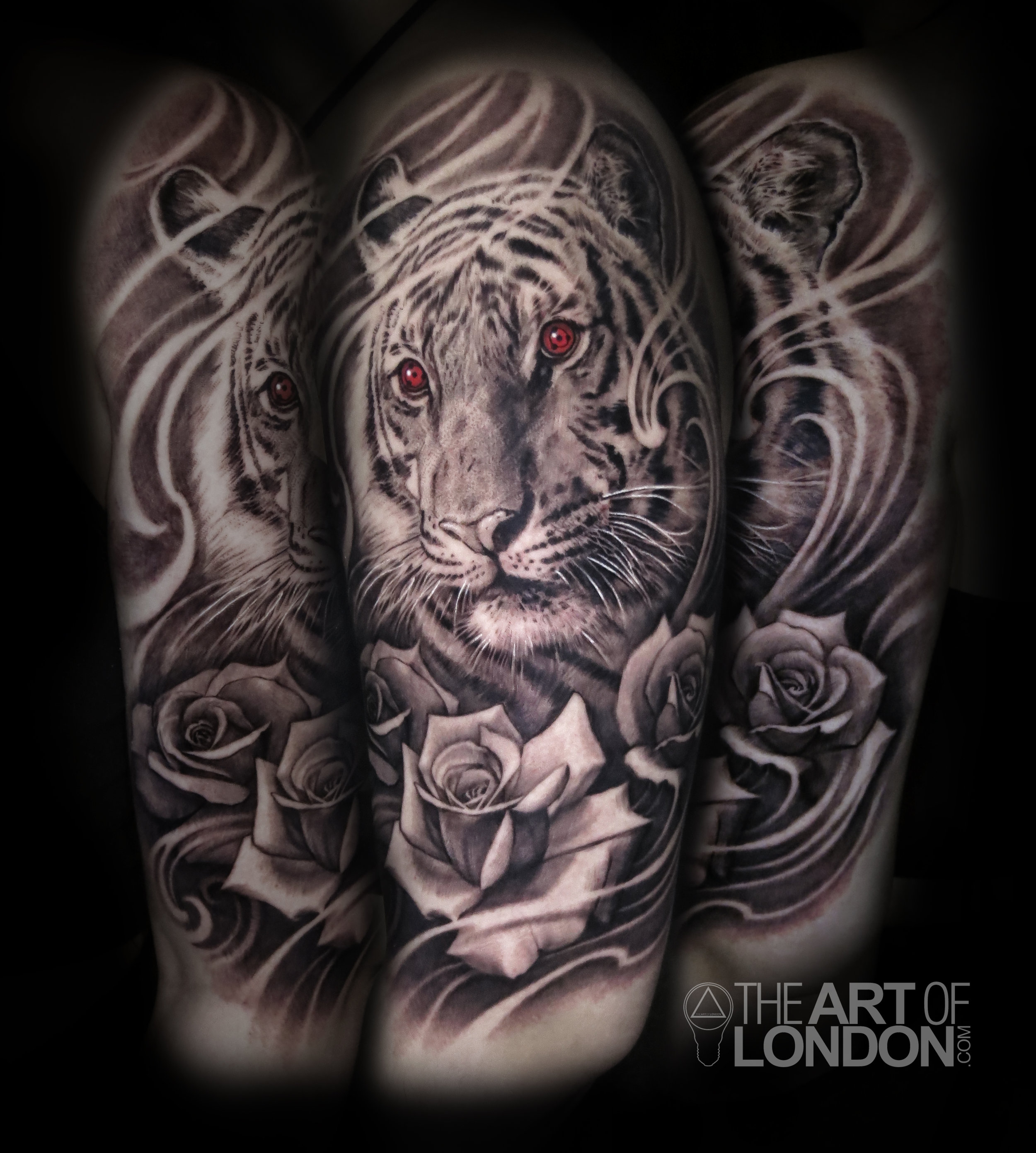tiger roses naruto black and grey tattoo.jpg