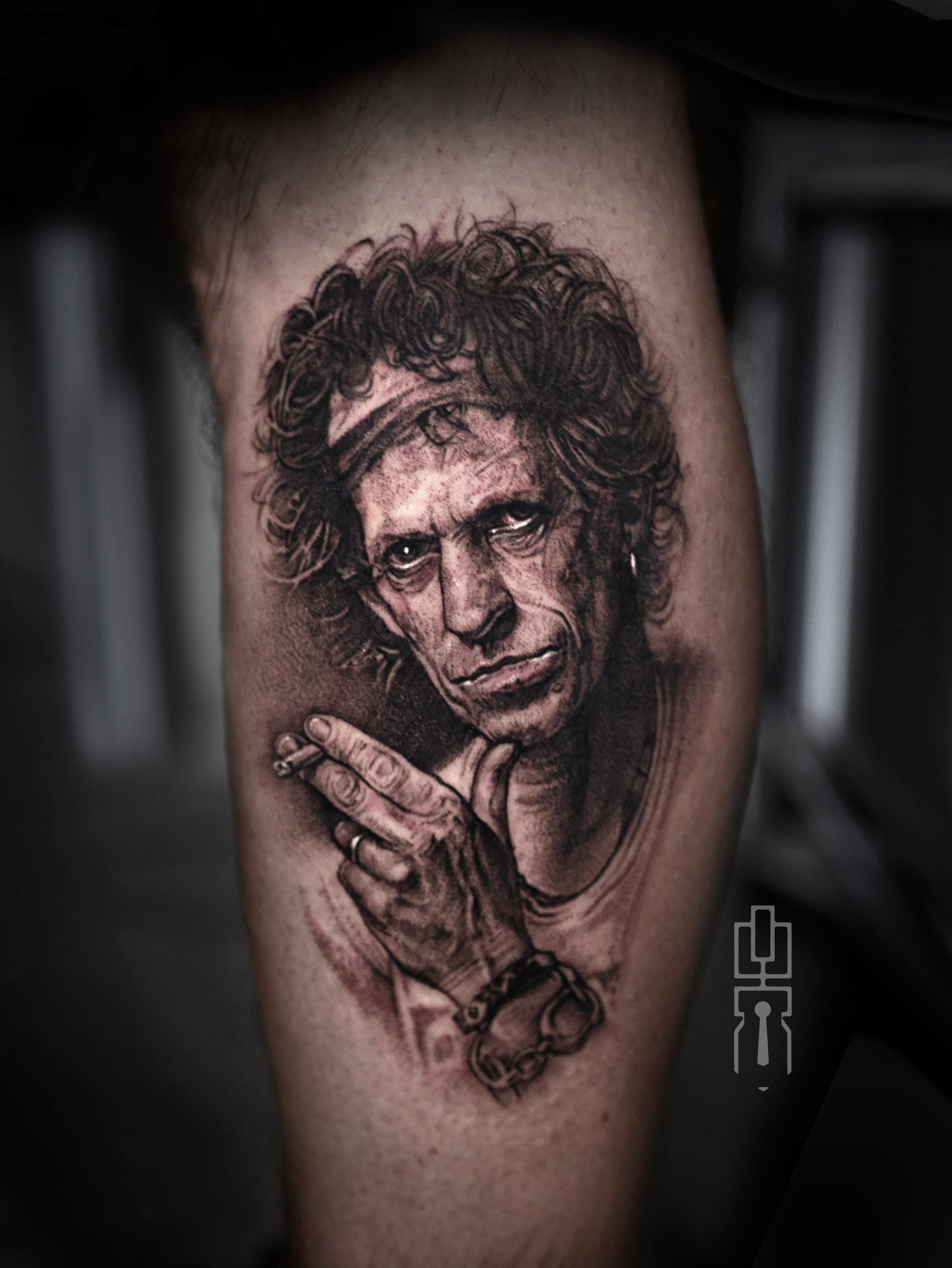 keith richards black and grey rolling stones tattoo.jpg