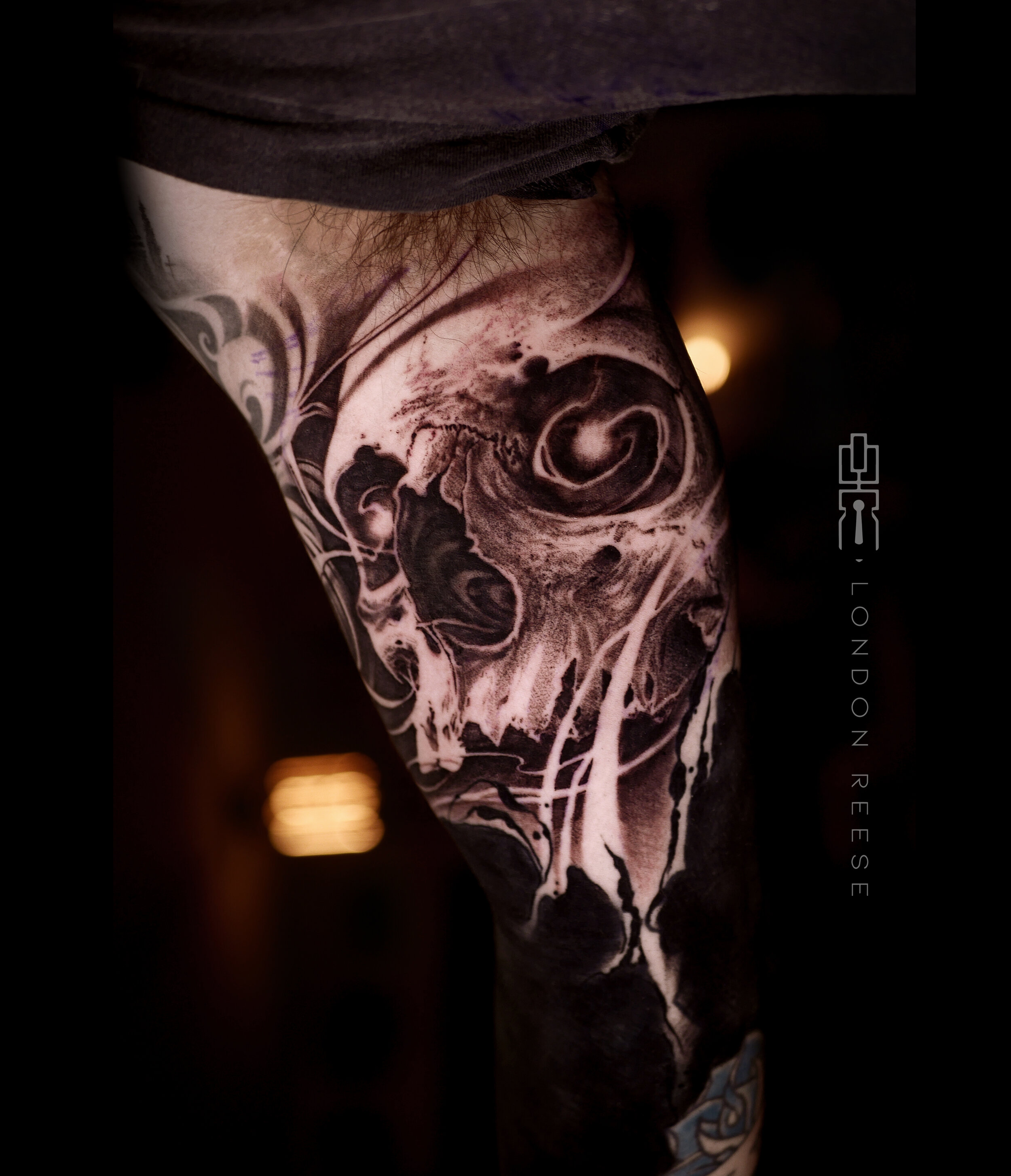 blackout black and grey skull tattoo 2.jpg
