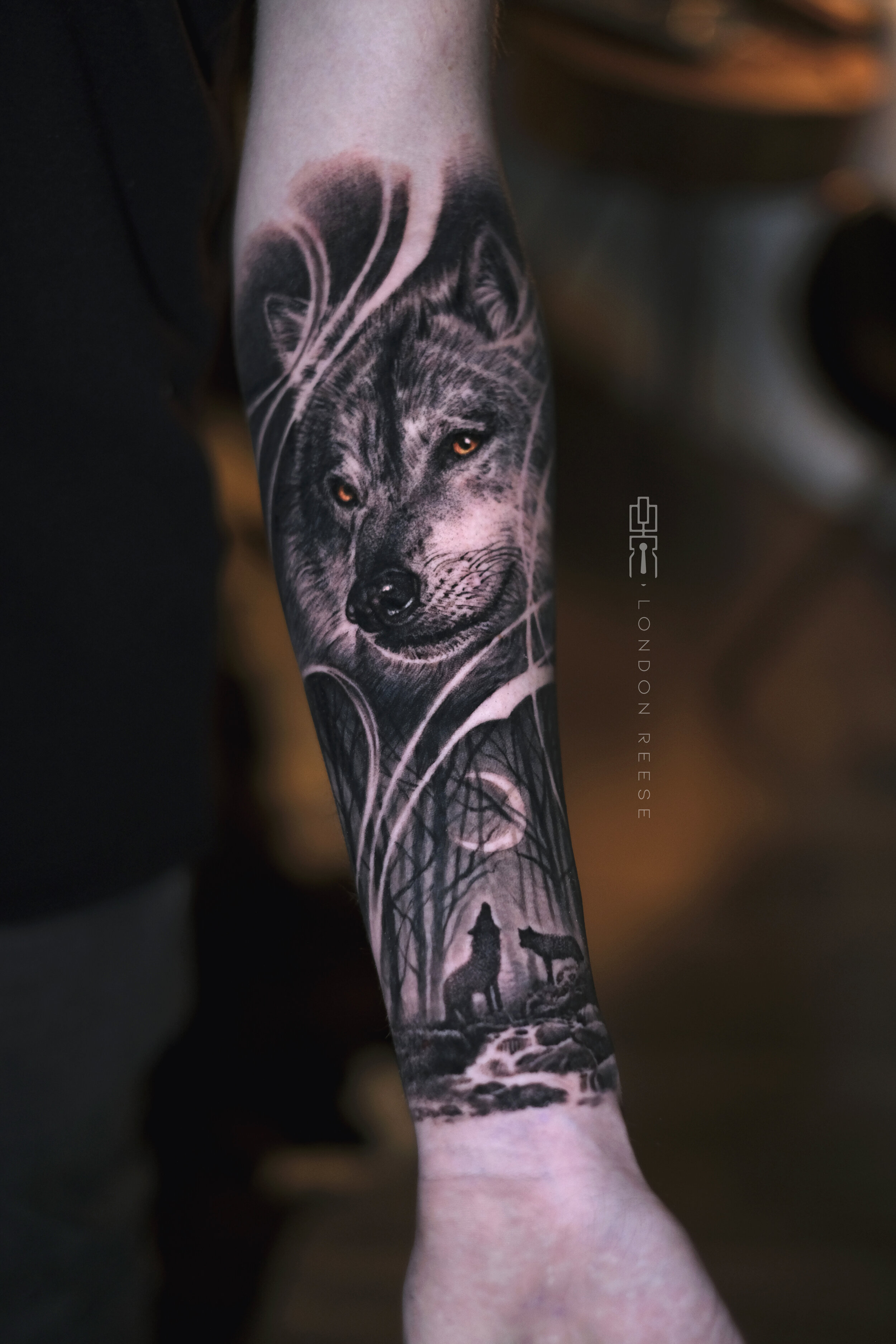 wolf golden eye black and grey tattoo.jpg