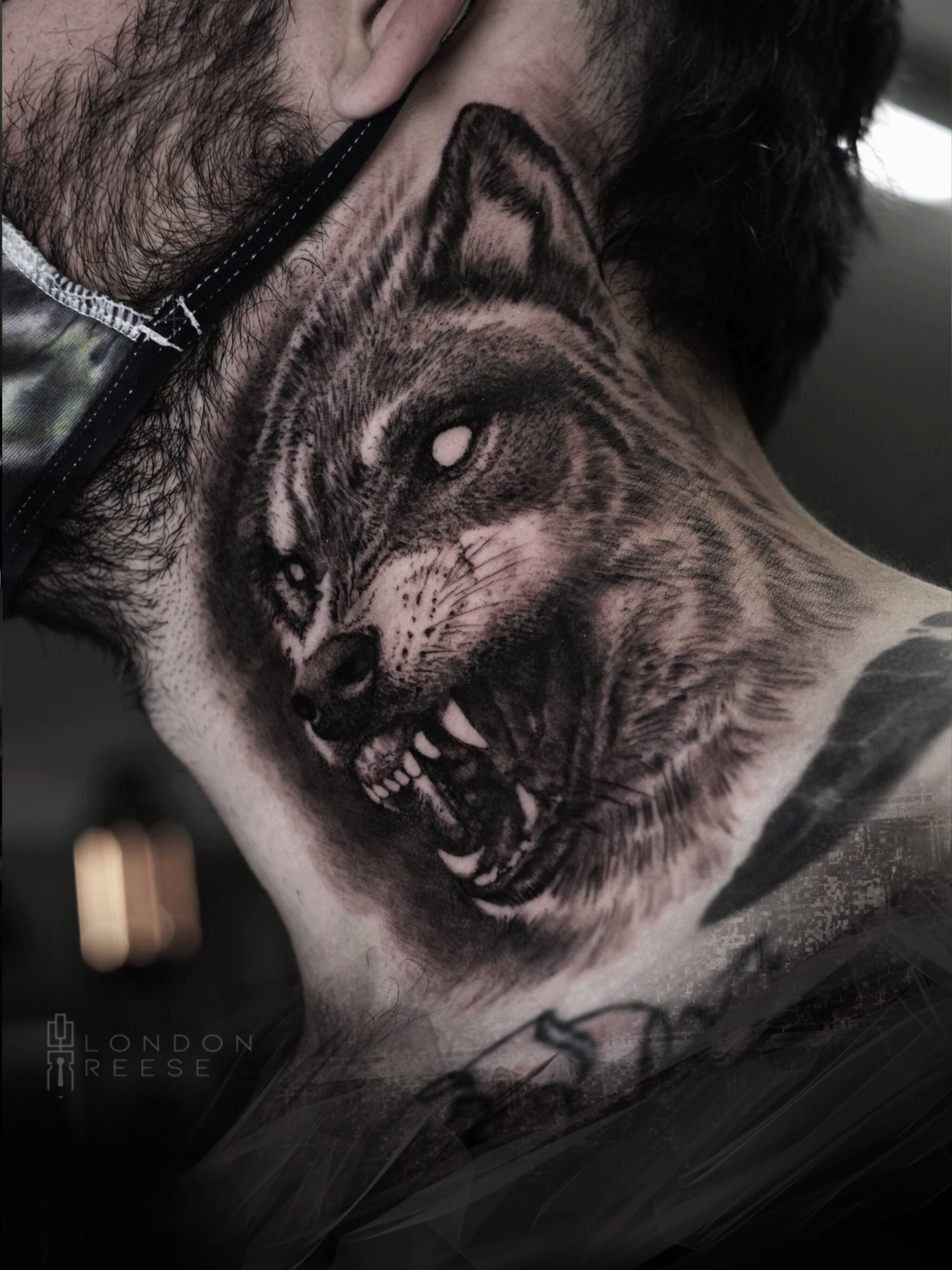 wolf neck tattoo close.JPG