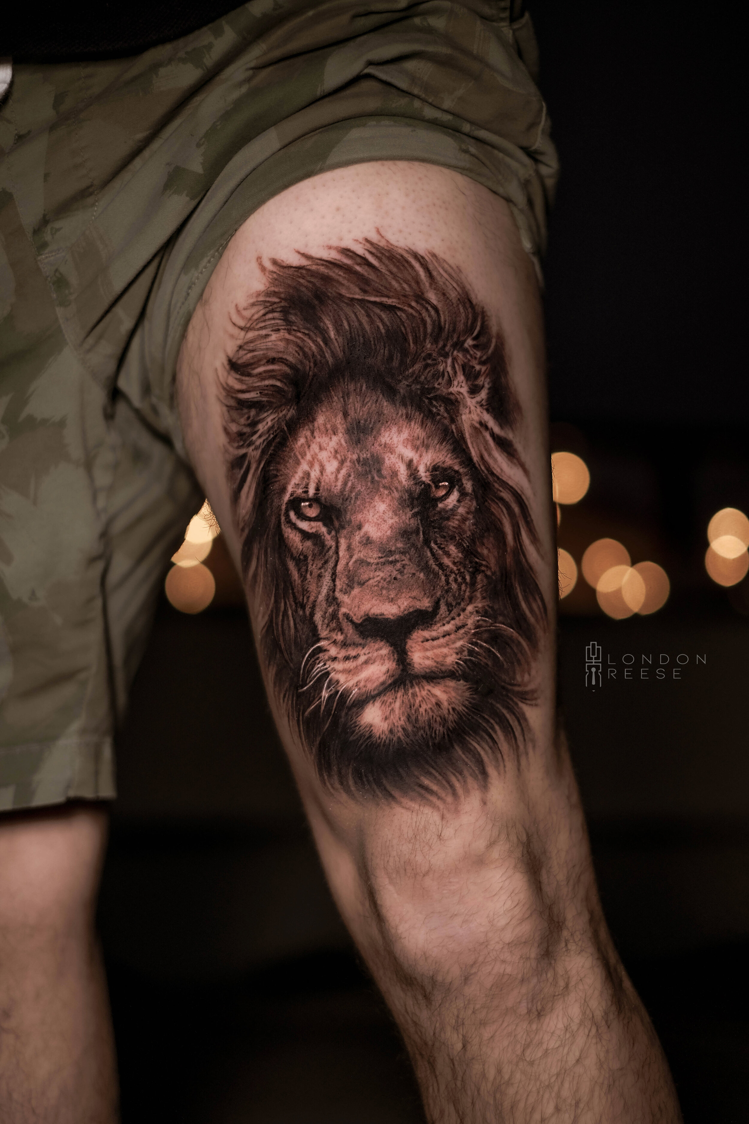 black and grey realism lion tattoo thigh 2 copy.jpg