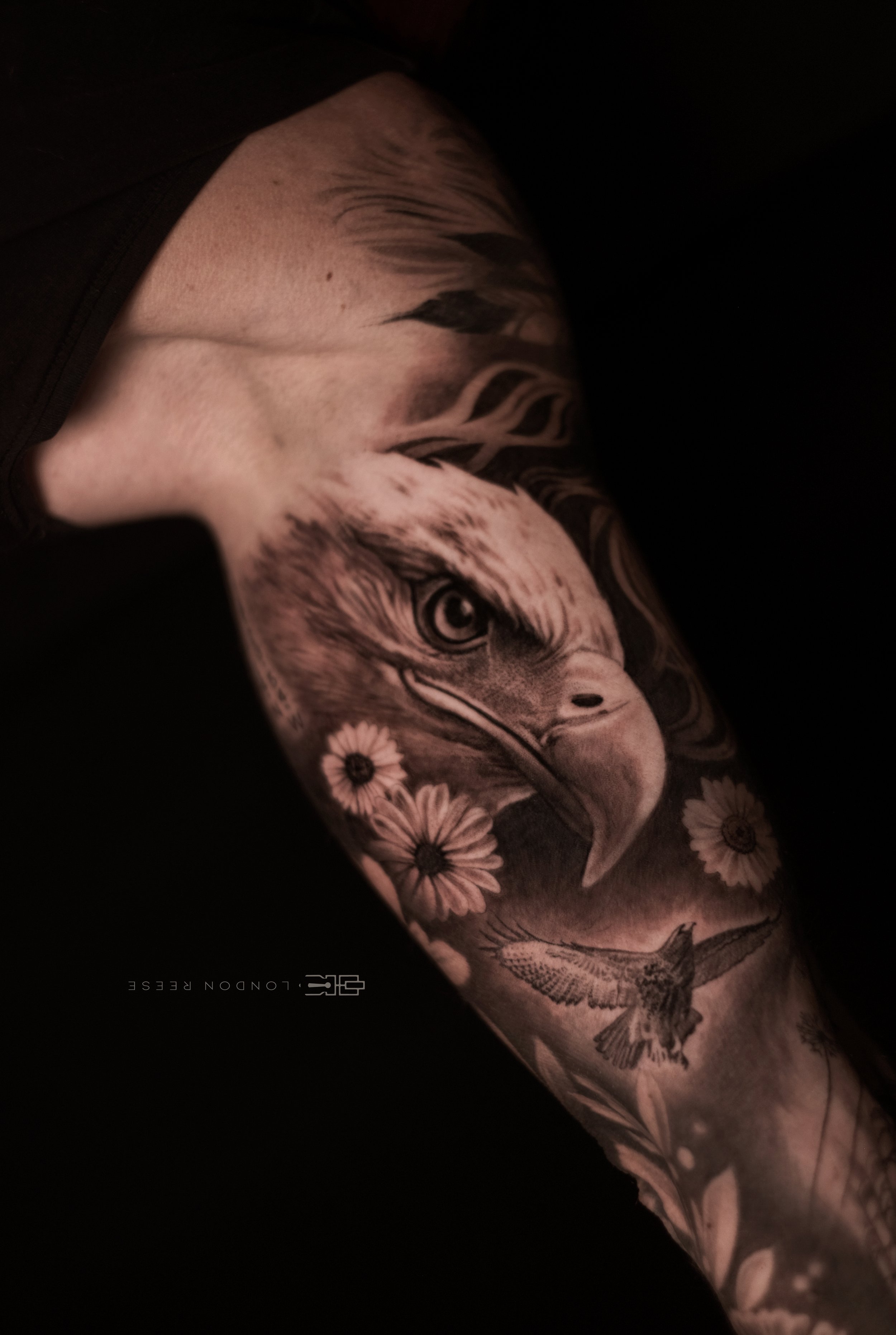 eagle daisies tattoo.jpg