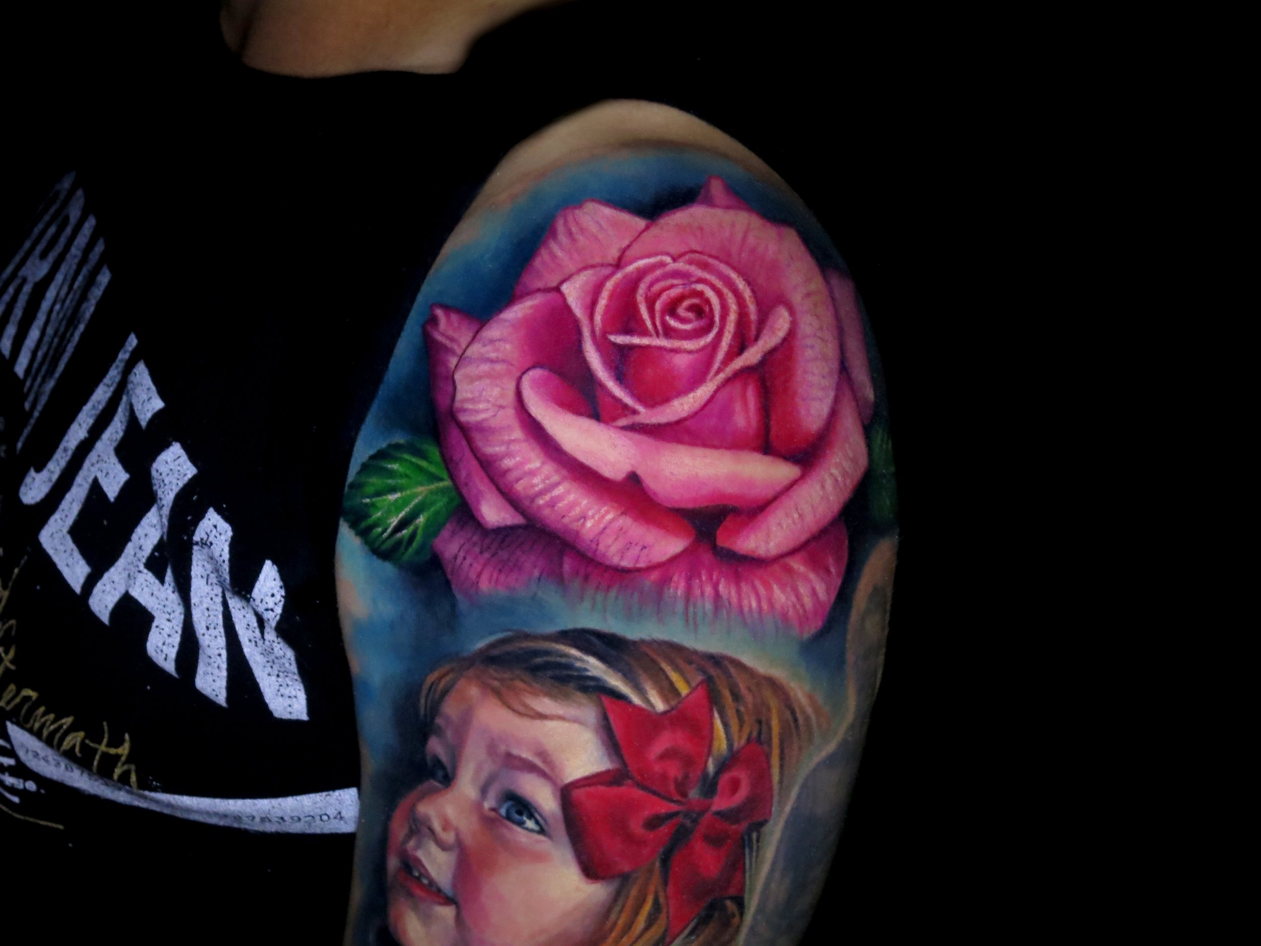 pink rose shoulder tattoo.jpg