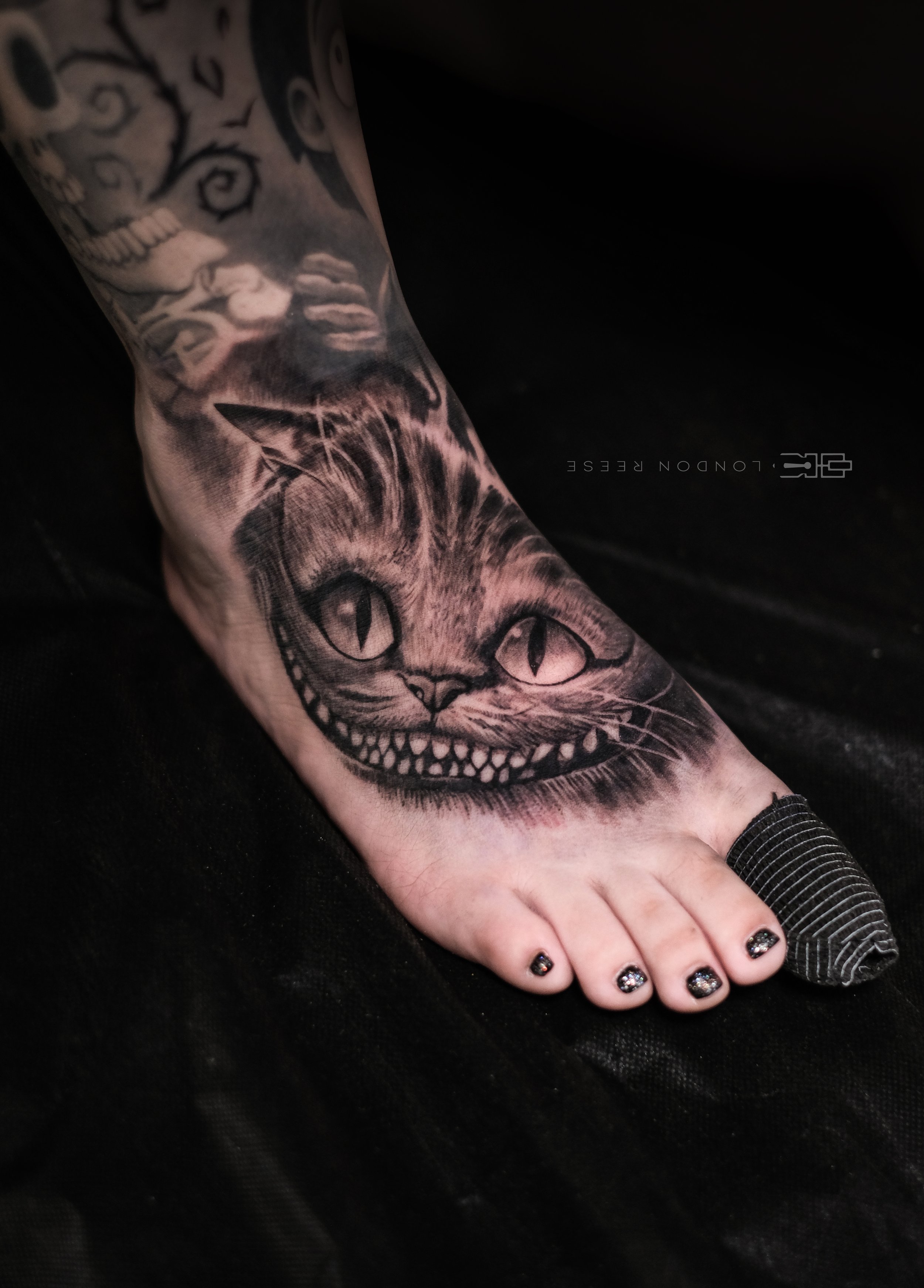 cheshire cat tim burton alice wonderland foot tattoo.jpg
