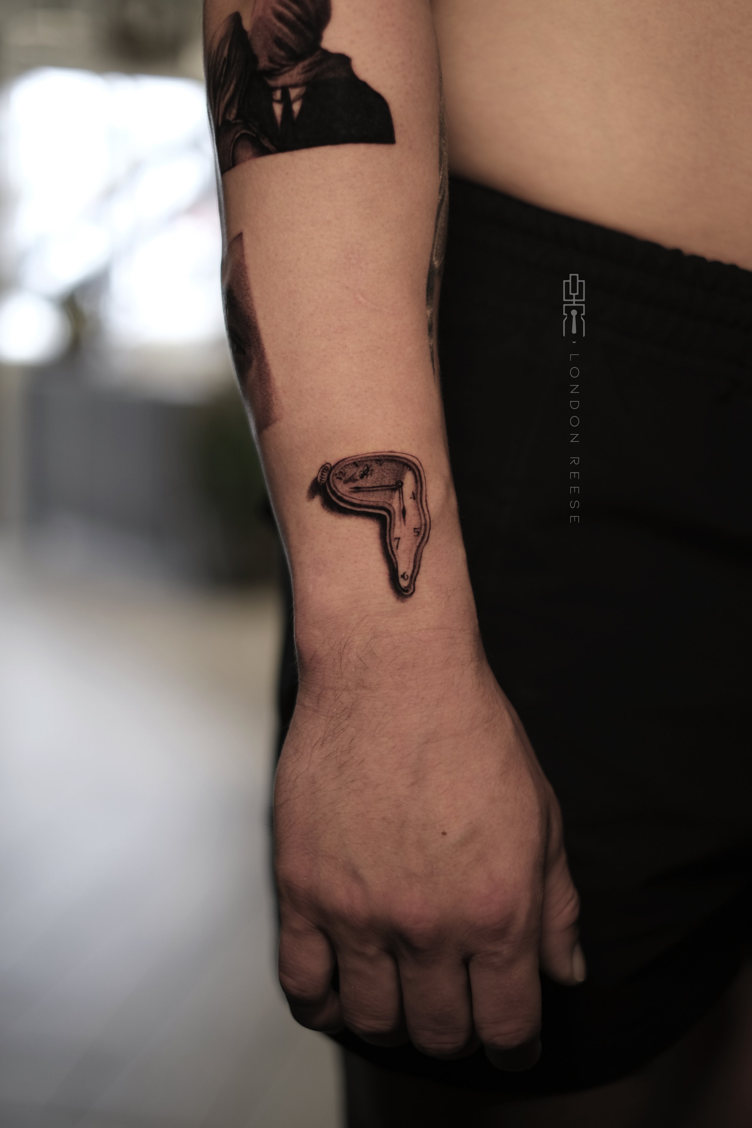 mini dali melting clock tattoo.jpg