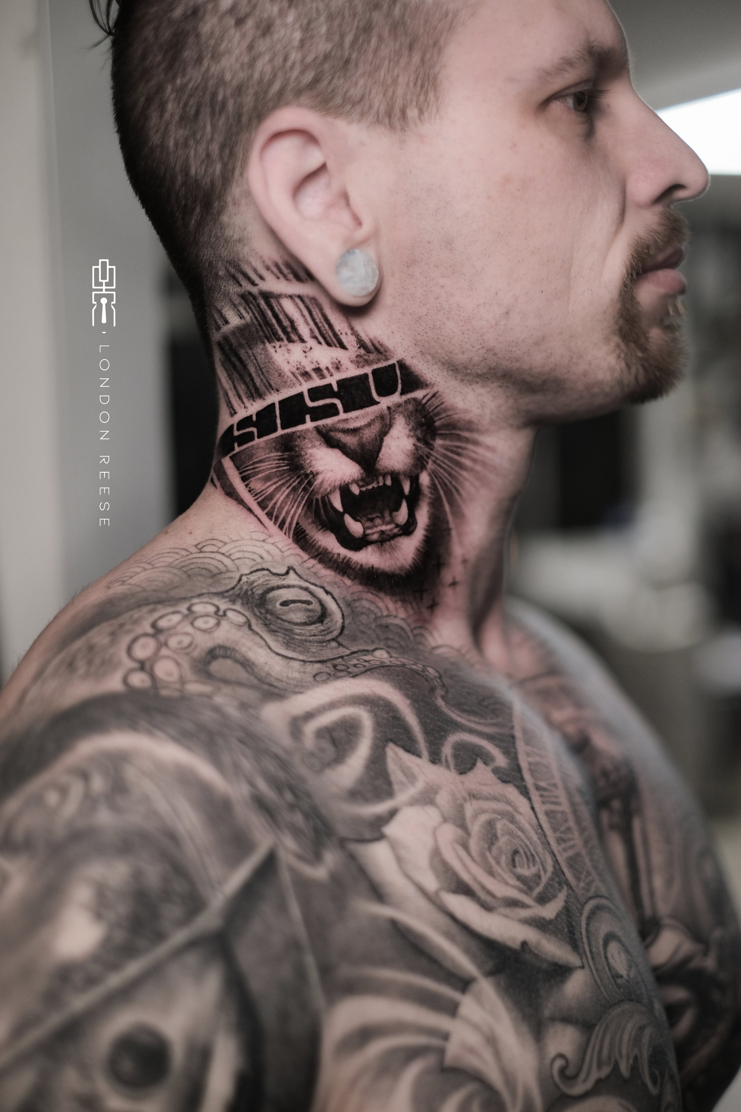 sisu neck tattoo.jpg