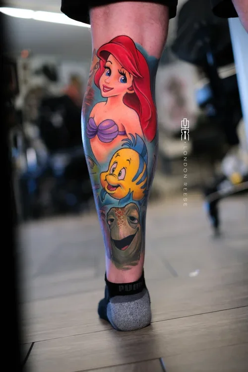 ariel+little+mermaid+flounder+tattoo.webp