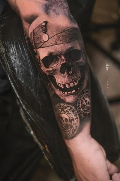 pirates+of+the+carribbean+skull+aztec+gold+tattoo+copy.webp