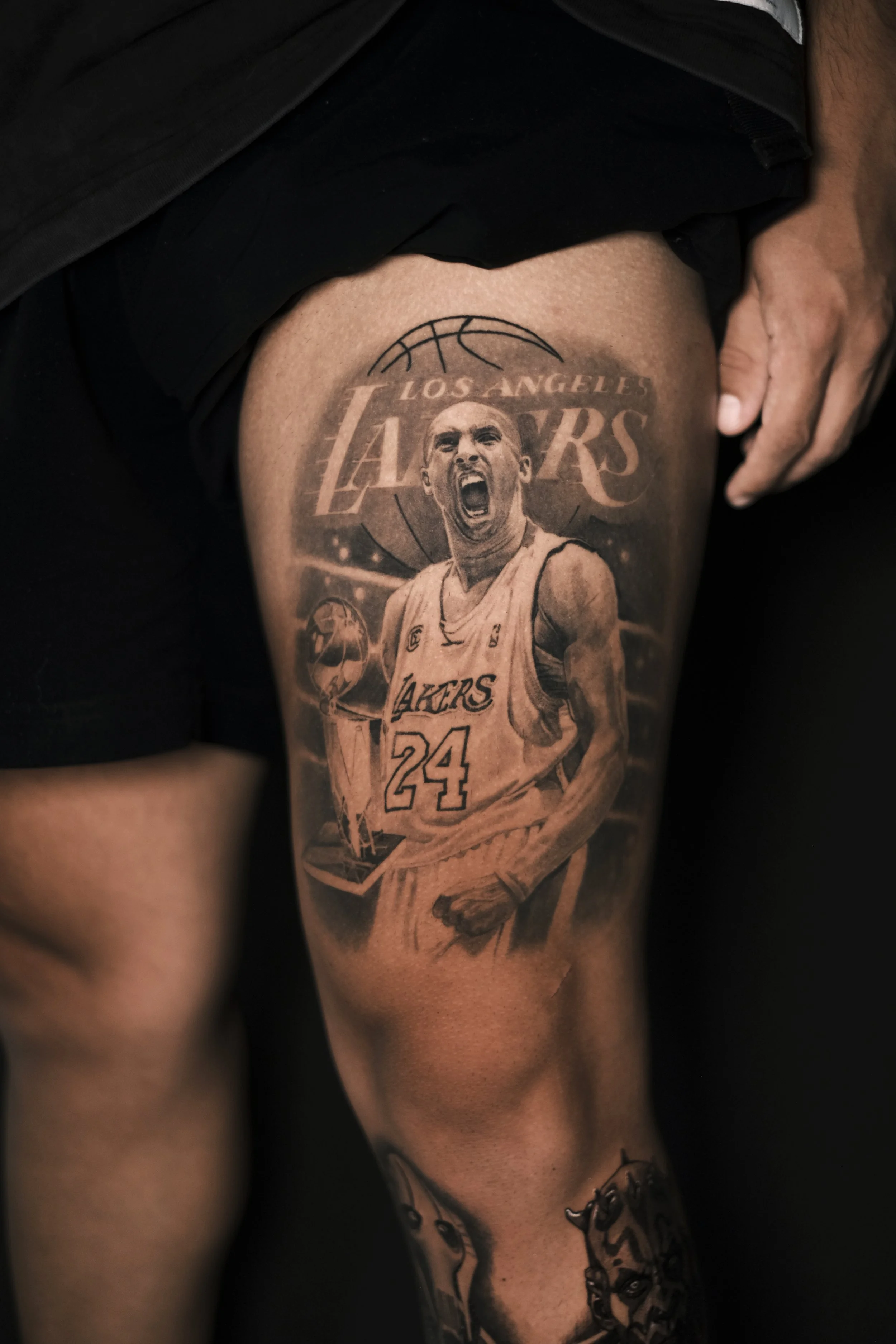 healed kobe bryant champion tattoo.jpg