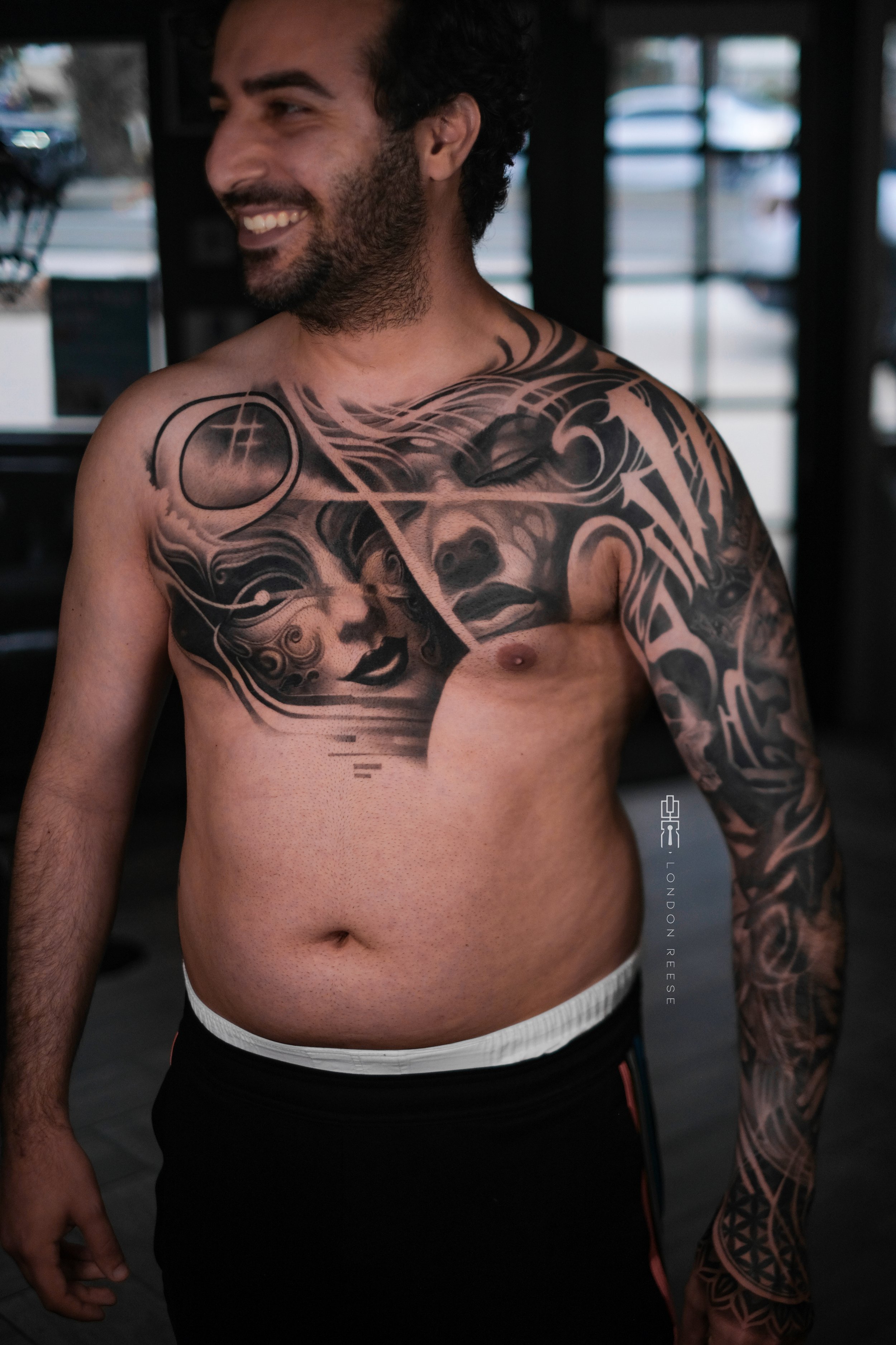 sleepnomore chest piece london reese healed venetian mask tattoo.jpg