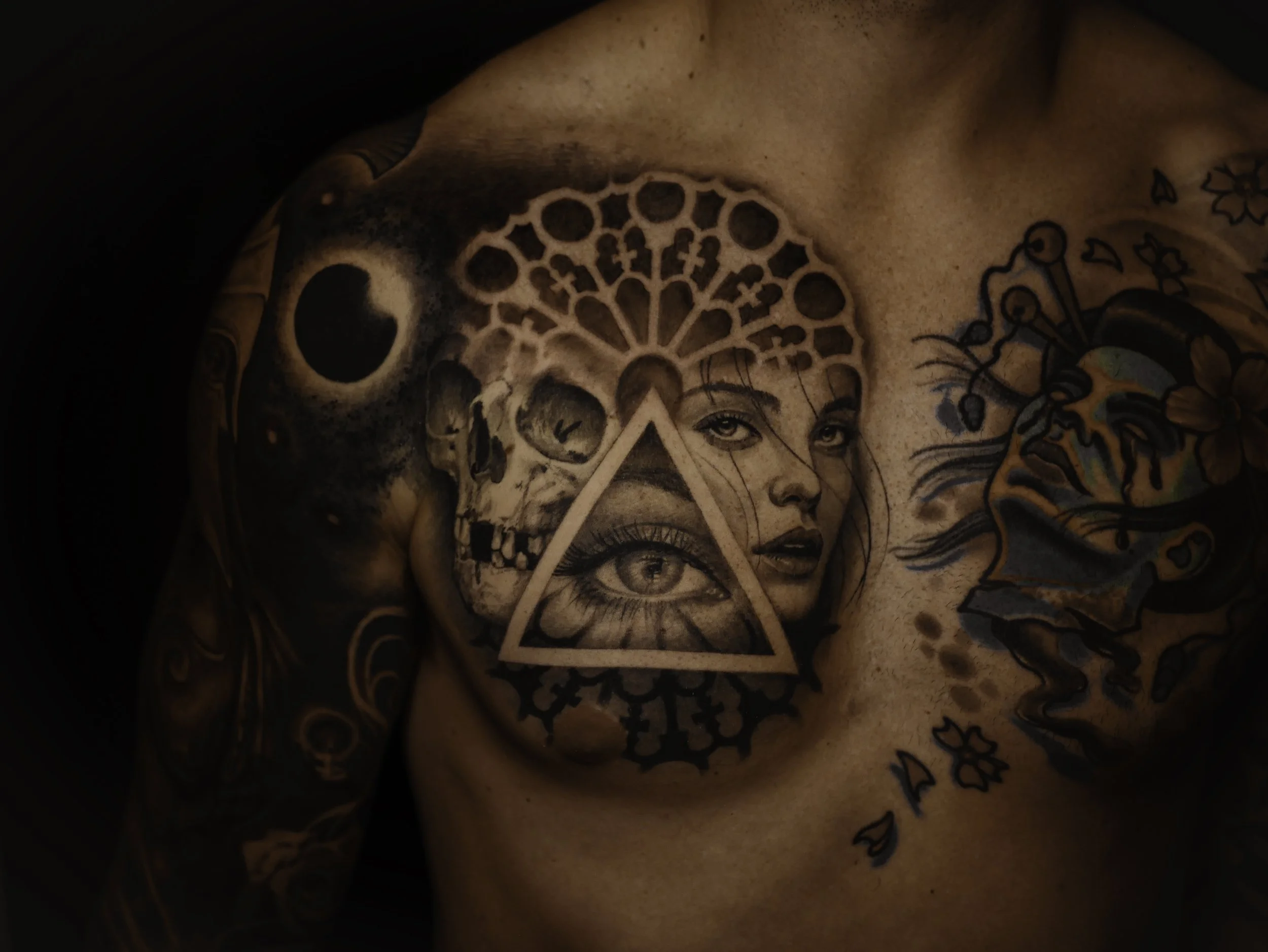 geo skull girl eye triangle all seeing chest piece copy.jpg