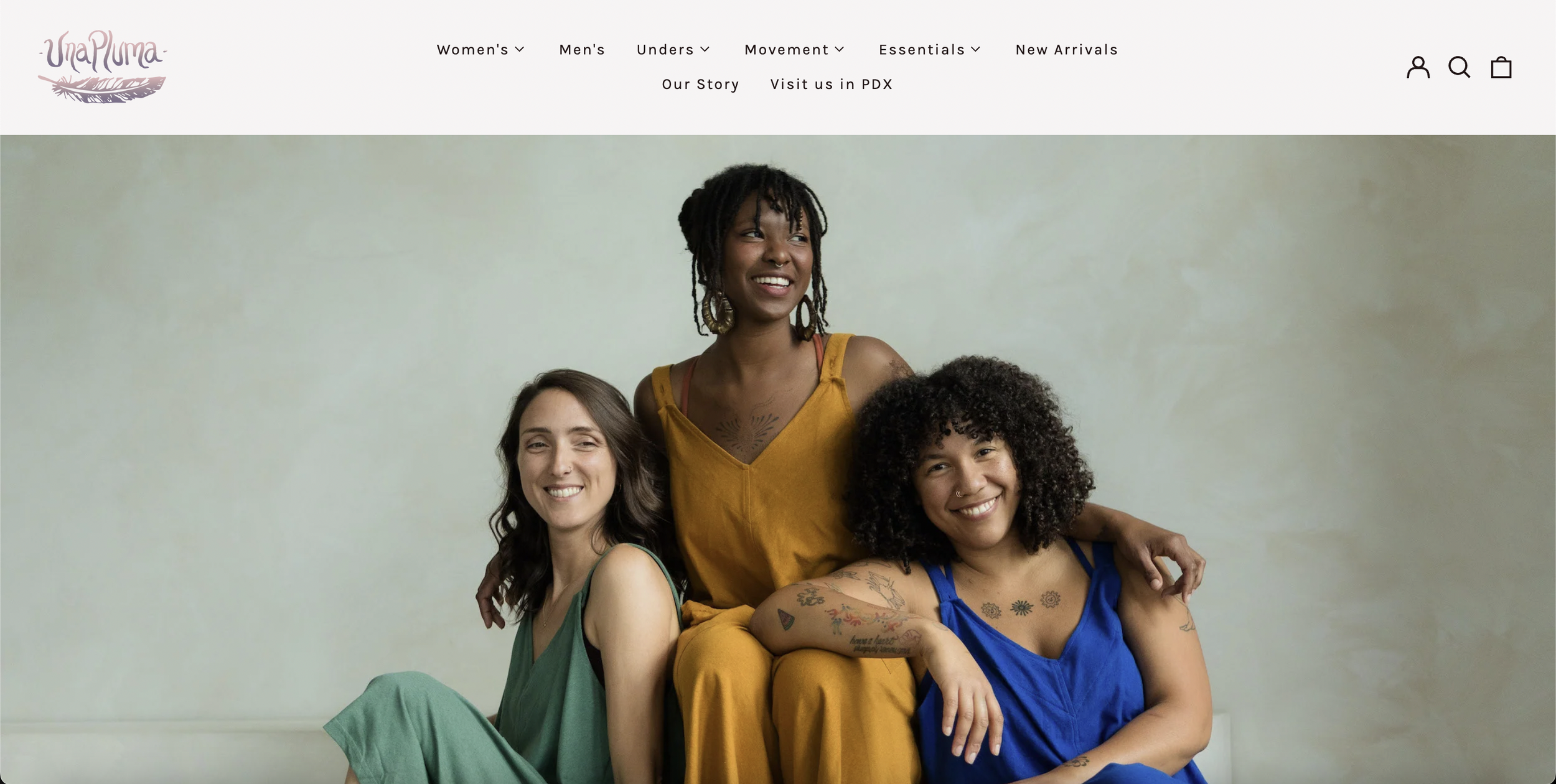 Homepage of unapluma.com, an e-commerce site for organic and ethically made clothing.