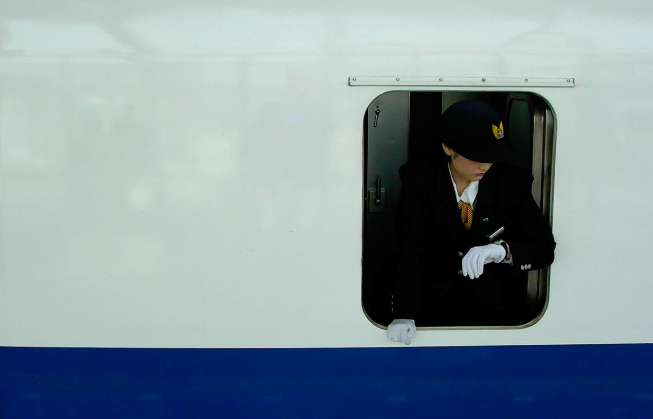 The Crisply-Pressed Uniform of a Shinkansen Conductor