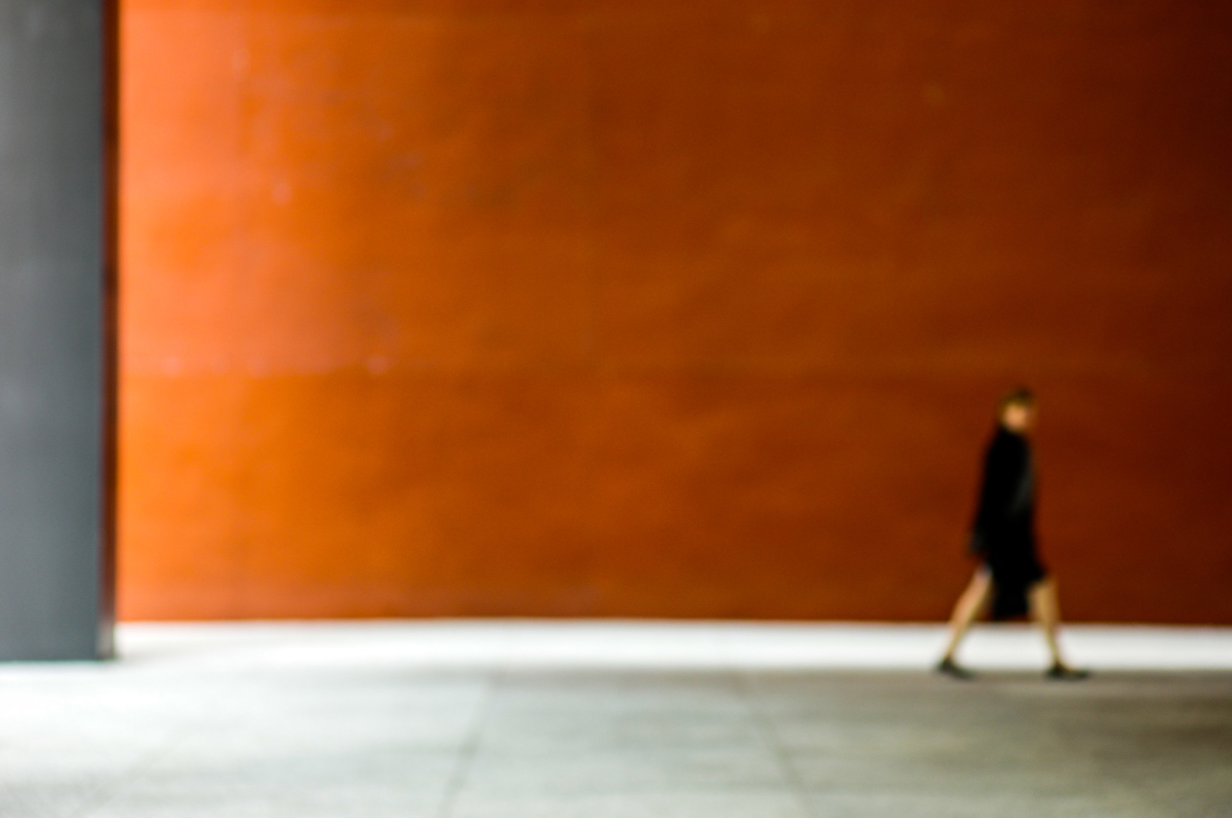 Figure Against an Orange Wall/2