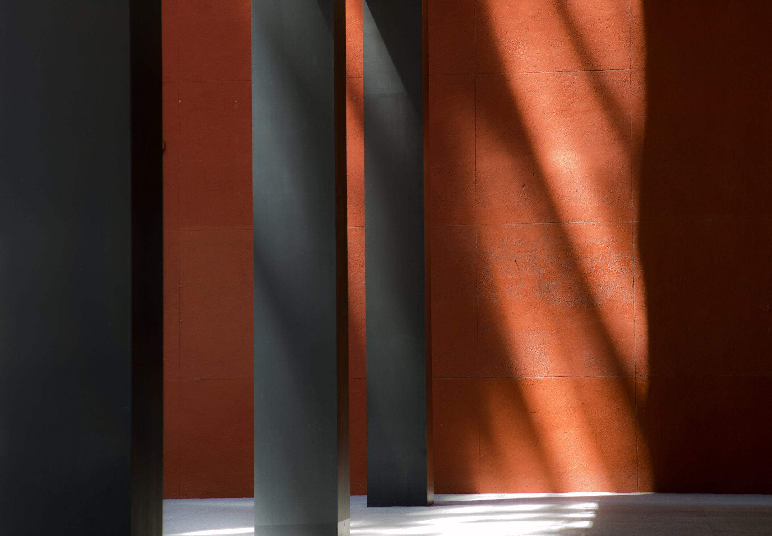 Orange Wall, Columns, Shadows