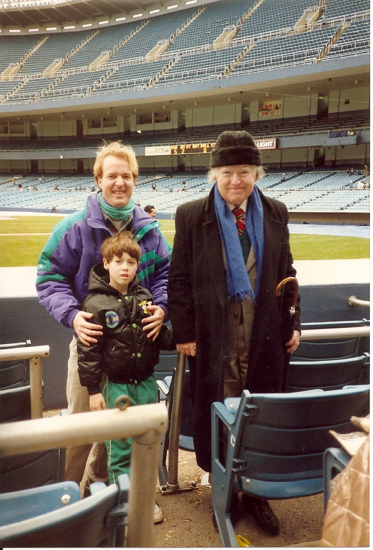 A young Douglas with his father and son at Yankee Stadium