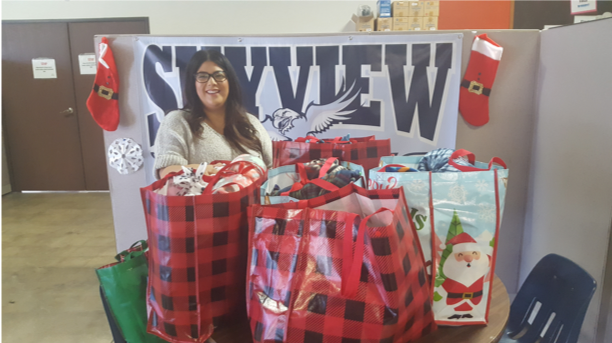 Handmade blankets by Care & Share members for Skyview students